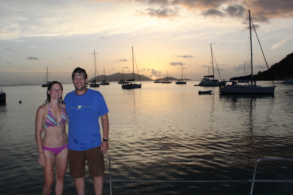 Megan and Teddy with Sun Setting Behind Jost Van Dyke - from Cane Garden Bay